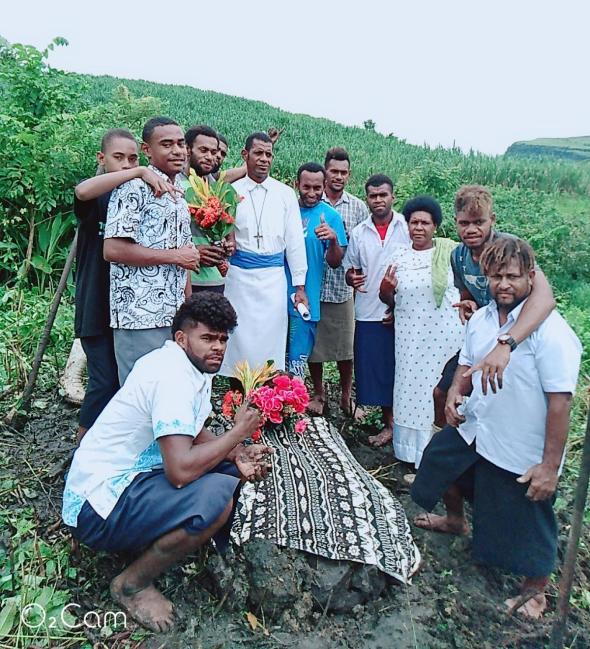 Everyone gathers at the burial site - Photo: Fr Patrick Colgan