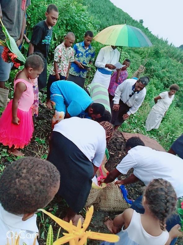 Mourners gather together to remember the little girl - Photo: Fr Patrick Colgan