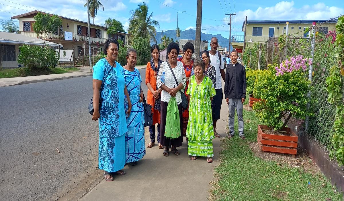 Fr. Francis joins the spiritual walk with a group of pilgrims in search of God. - Photo: Pescila Magdalin