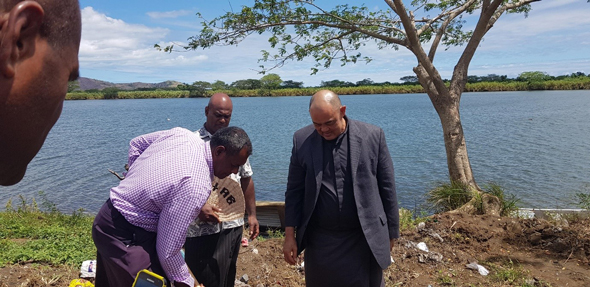 Archbishop and Church leaders planting a coconut tree after the ecumenical riverside service  - Photo: Fr Pat Colgan