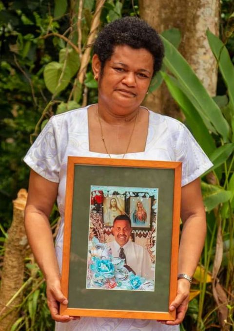 Mrs Lani Camaitoga holds a photo of Melisio - Photo: Fr Donal McIlraith