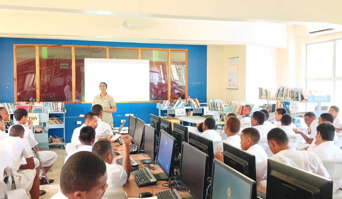 Students are focussed  and smiling is the way to build Peace. - Photo: Pescila Magdalin