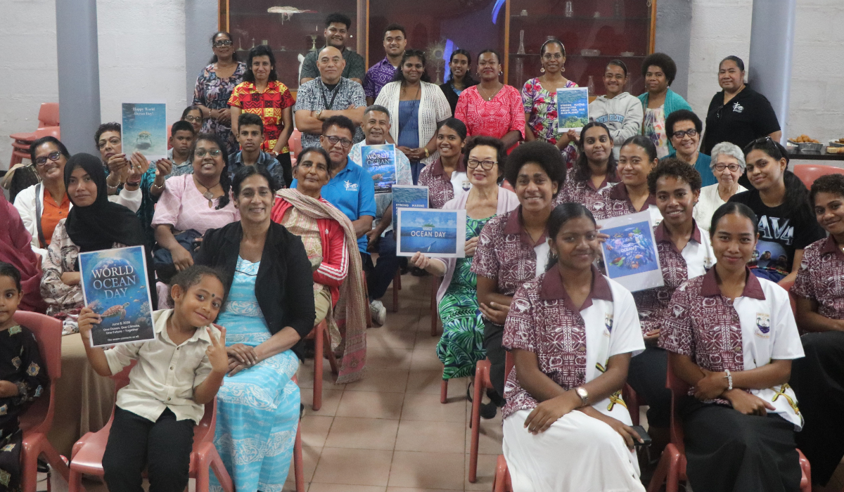   A diverse group of people from different faiths united in support of protecting the ocean and the environment by holding colourful posters with messages “One Earth, One Future, Clean Oceans, Healthy Planet and together for Nature”.  - Photo: Pescila Magdalin