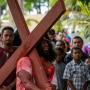 Different faiths come together, united by the cross